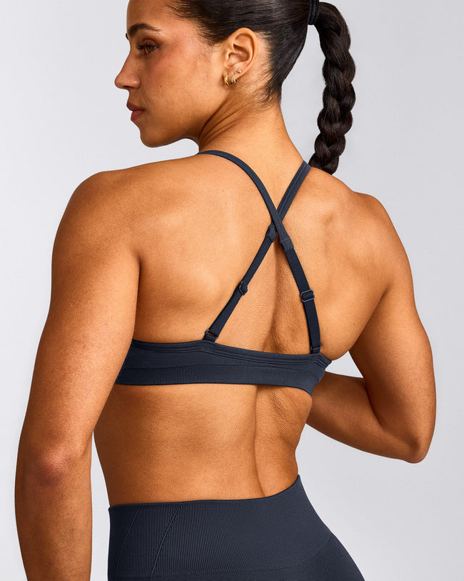 EnhanceLift™ Seamless Strappy Sports Bra with Grey Logo | True Blue