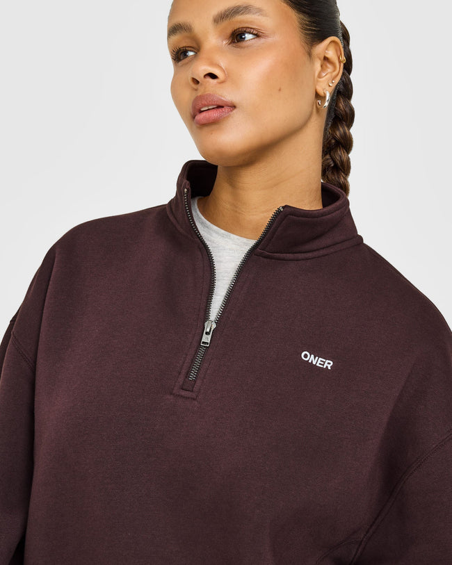 Foundations 1/4 Zip Sweatshirt with Grey Logo | Plum Brown