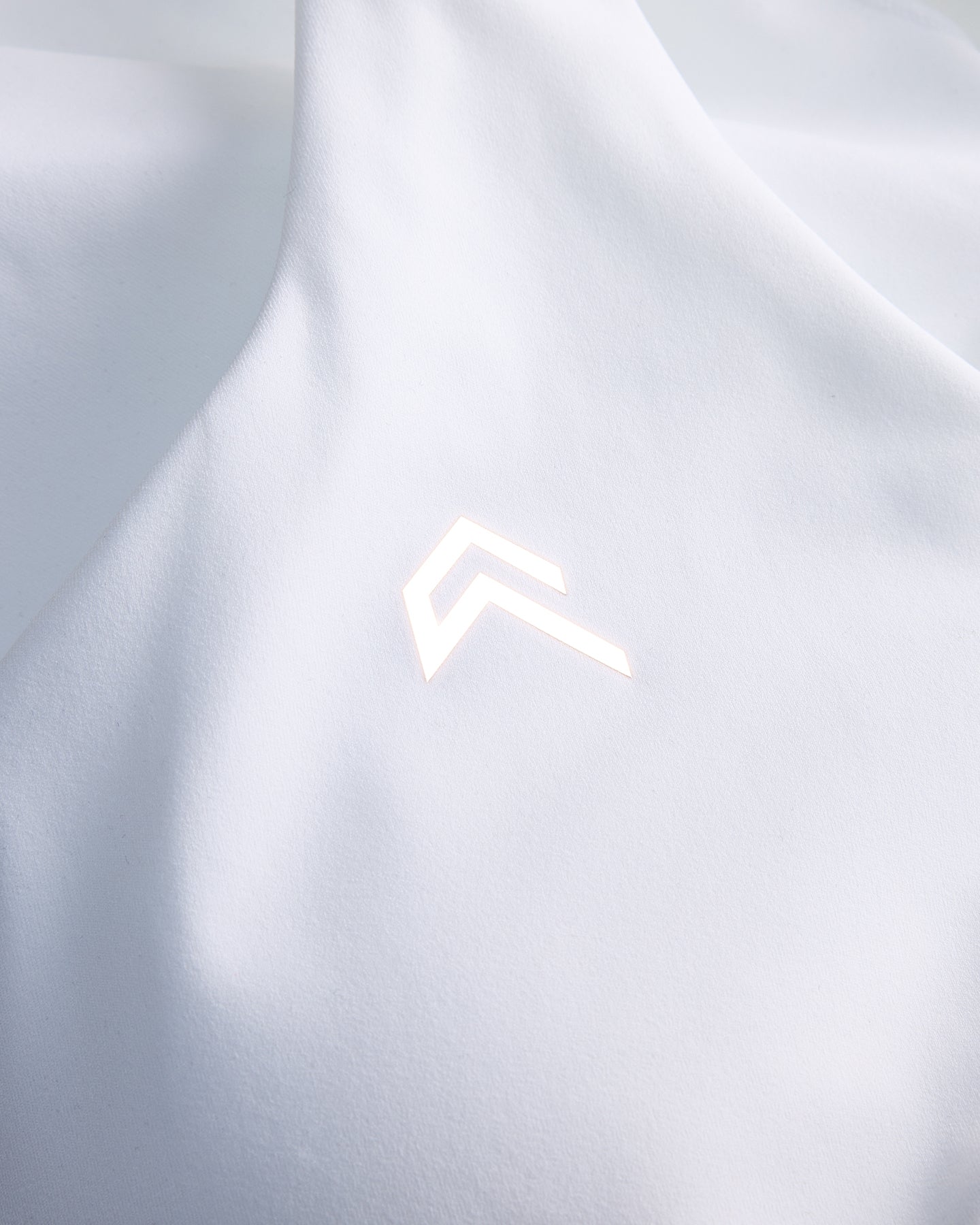 UnifiedMove™ V Neck Cross Back Vest with Reflective Logo | White