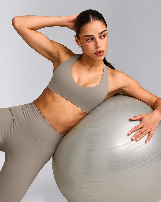 SoftMotion™ Bralette with White Logo | Warm Sand