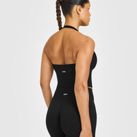 SoftMotion™ Halter Neck Mid Vest with Built in Bra Shelf with White Logo | Black