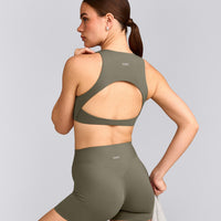 SoftMotion™ High Neck Sports Bra with Grey Logo | Alpine Green
