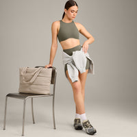 SoftMotion™ High Neck Sports Bra with Grey Logo | Alpine Green