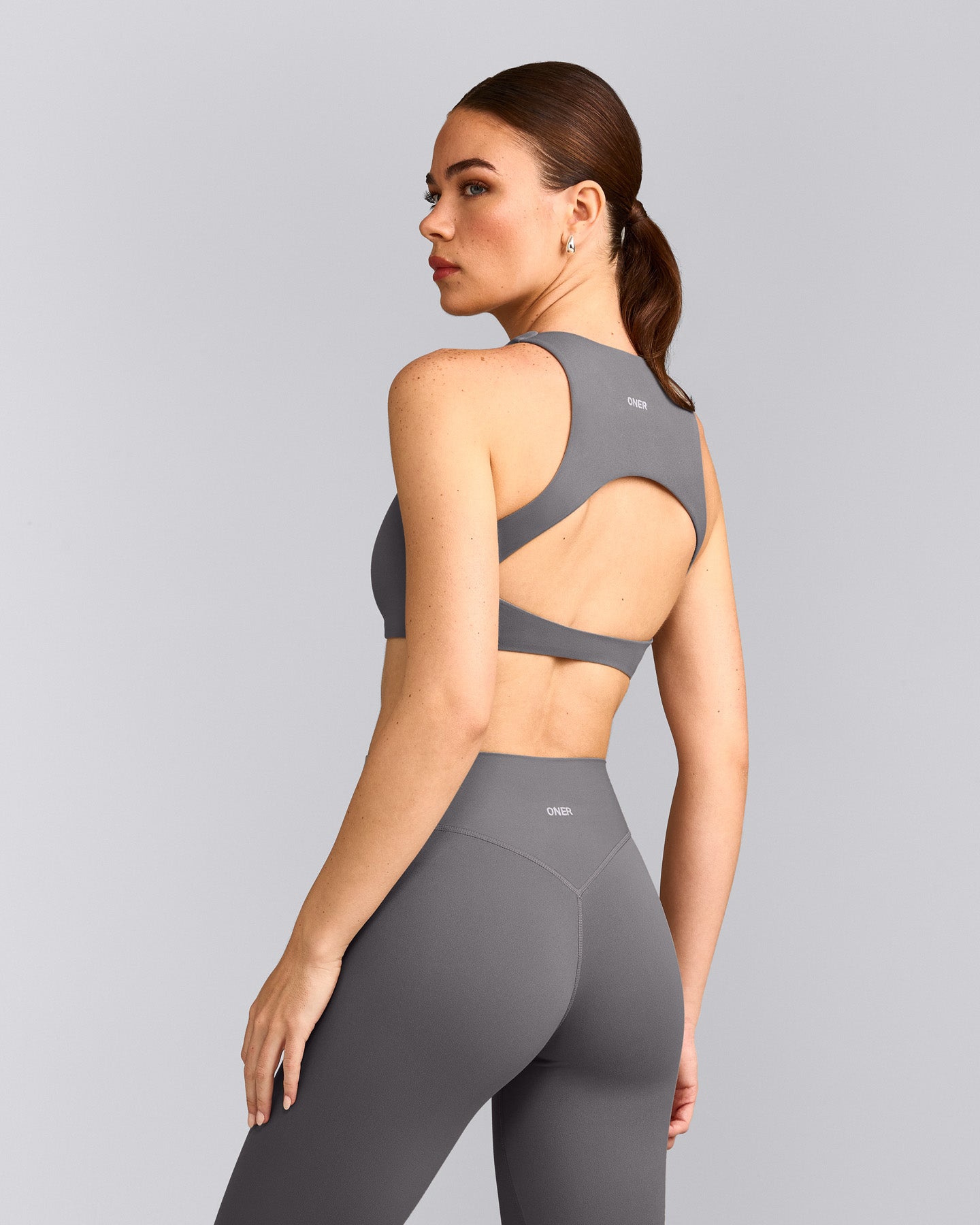 SoftMotion™ High Neck Sports Bra with Grey Logo | Ash Grey