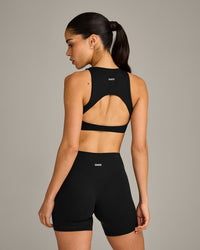SoftMotion™ High Neck Sports Bra with Grey Logo | Black