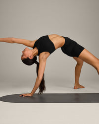 SoftMotion™ High Neck Sports Bra with Grey Logo | Black