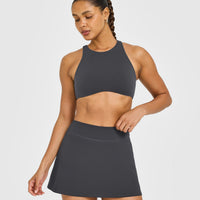 SoftMotion™ High Neck Sports Bra with White Logo | Coal