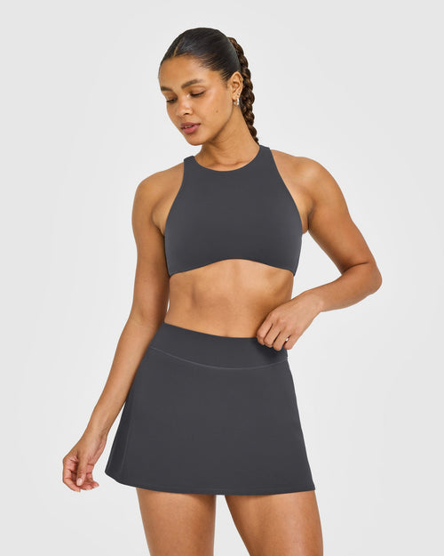 SoftMotion™ High Neck Sports Bra with White Logo | Coal