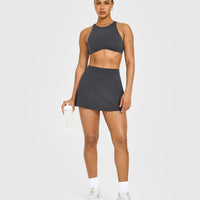 SoftMotion™ High Neck Sports Bra with White Logo | Coal