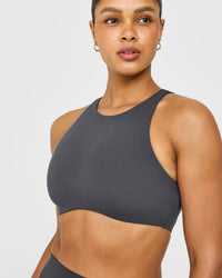 SoftMotion™ High Neck Sports Bra with White Logo | Coal
