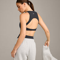 SoftMotion™ High Neck Sports Bra with Grey Logo | Coal