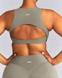SoftMotion™ High Neck Sports Bra | Alpine Green