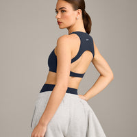 SoftMotion™ High Neck Sports Bra with Grey Logo | True Blue