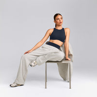 SoftMotion™ High Neck Sports Bra with Grey Logo | True Blue