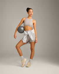 SoftMotion™ High Neck Sports Bra with White Logo | Warm Sand