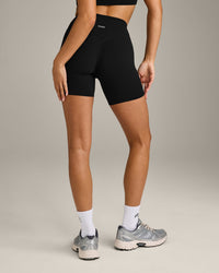 SoftMotion™ High Waisted Shorts 6" with Grey Logo | Black