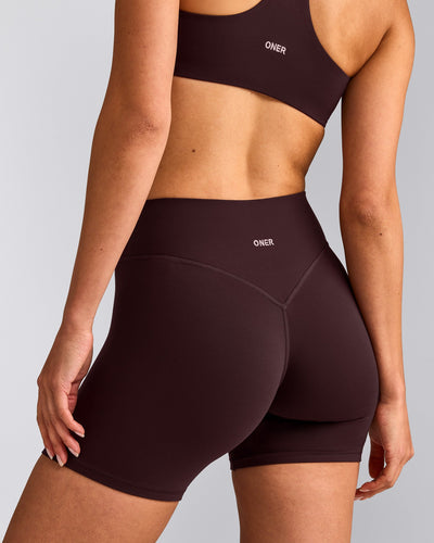 SoftMotion™ High Waisted Shorts 6" with Grey Logo | Plum Brown