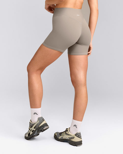 SoftMotion™ High Waisted Shorts 6" with White Logo | Warm Sand