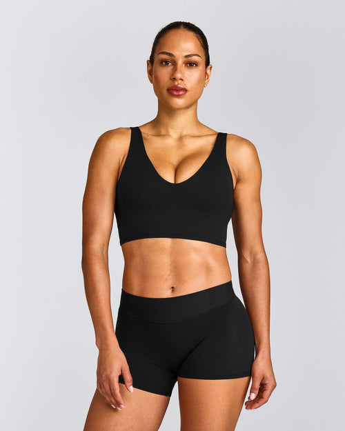SoftMotion™ Longline Sports Bra with Grey Logo | Black