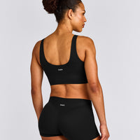 SoftMotion™ Longline Sports Bra with Grey Logo | Black