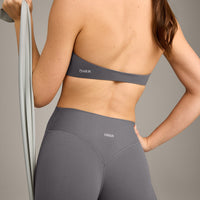 SoftMotion™ Minimal Halter Neck Bralette with Grey Logo | Ash Grey