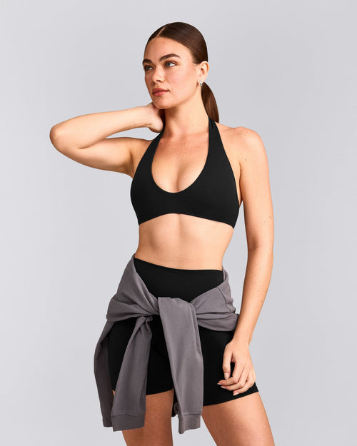 SoftMotion™ Minimal Halter Neck Bralette with Grey Logo | Black
