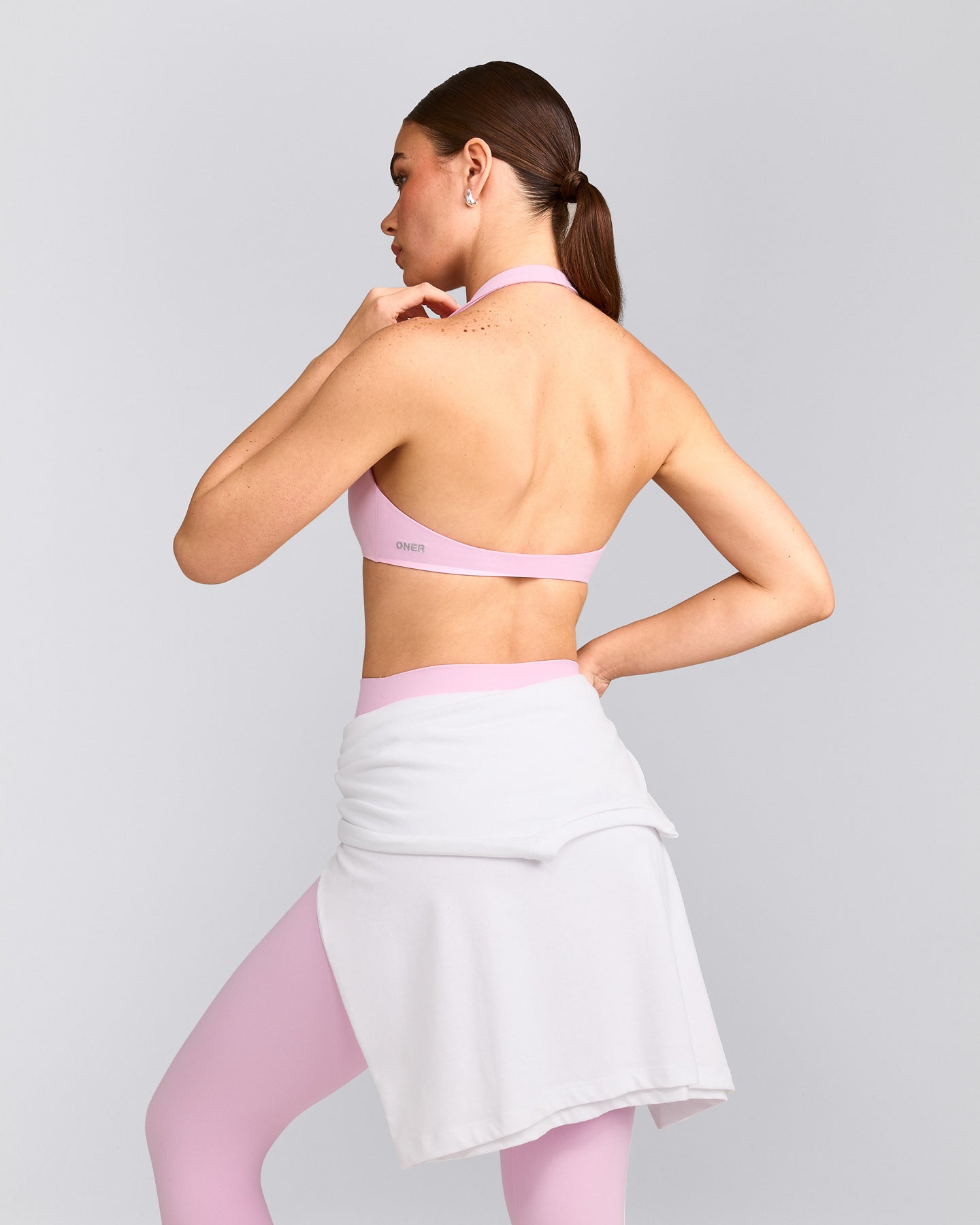 SoftMotion™ Minimal Halter Neck Bralette with Grey Logo | Chalk Pink