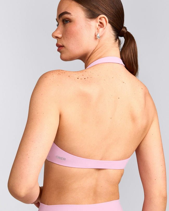 SoftMotion™ Minimal Halter Neck Bralette with Grey Logo | Chalk Pink