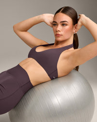 SoftMotion™ Minimal Halter Neck Bralette with Grey Logo | Dark Umber Brown