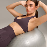 SoftMotion™ Minimal Halter Neck Bralette with Grey Logo | Dark Umber Brown