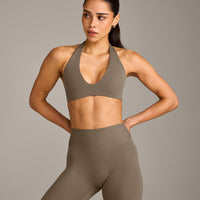 SoftMotion™ Minimal Halter Neck Bralette with Grey Logo | Moss Brown