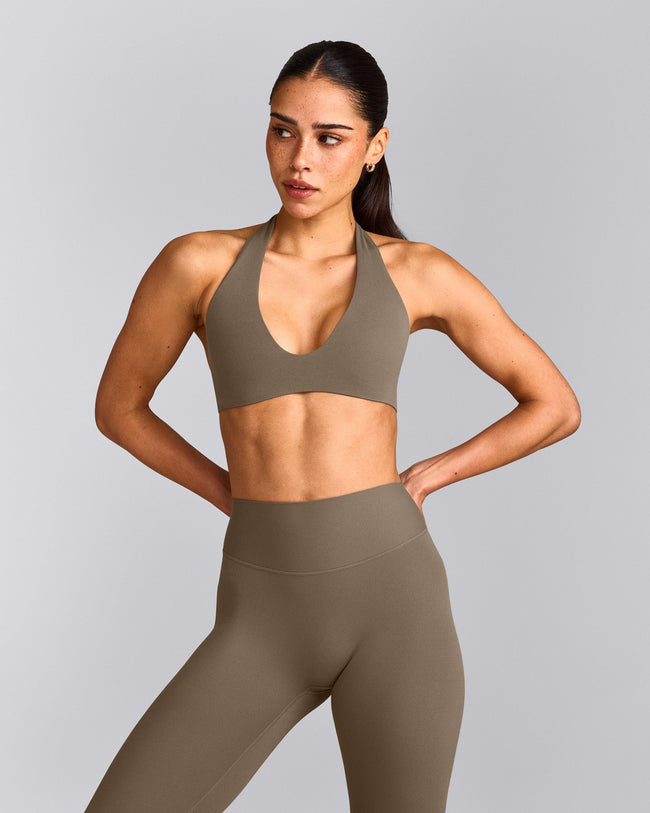 SoftMotion™ Minimal Halter Neck Bralette with Grey Logo | Moss Brown
