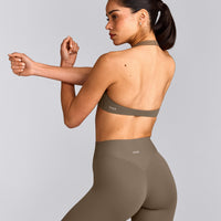 SoftMotion™ Minimal Halter Neck Bralette with Grey Logo | Moss Brown