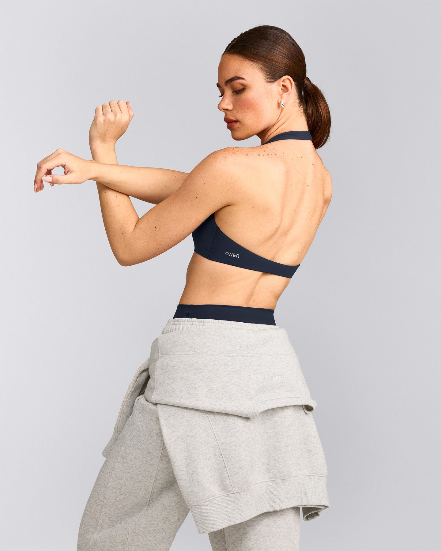 SoftMotion™ Minimal Halter Neck Bralette with Grey Logo | True Blue