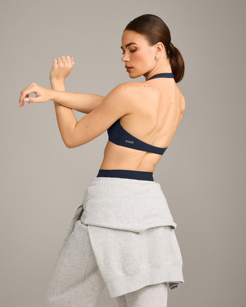 SoftMotion™ Minimal Halter Neck Bralette with Grey Logo | True Blue