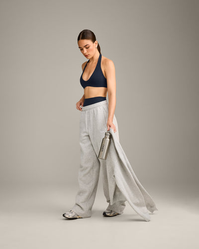 SoftMotion™ Minimal Halter Neck Bralette with Grey Logo | True Blue