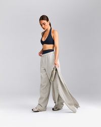 SoftMotion™ Minimal Halter Neck Bralette with Grey Logo | True Blue