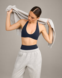 SoftMotion™ Minimal Halter Neck Bralette with Grey Logo | True Blue