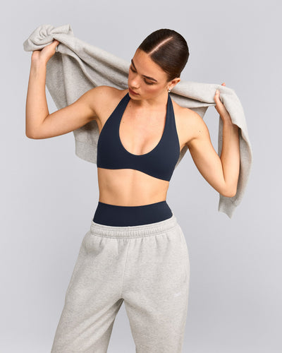 SoftMotion™ Minimal Halter Neck Bralette with Grey Logo | True Blue