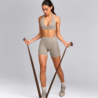 SoftMotion™ Minimal Halter Neck Bralette with White Logo | Warm Sand