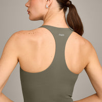 SoftMotion™ Racer Back Mid Vest with Built in Bra Shelf with Grey Logo | Alpine Green