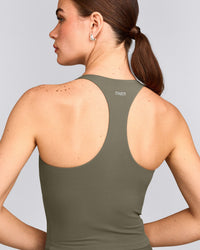 SoftMotion™ Racer Back Mid Vest with Built in Bra Shelf with Grey Logo | Alpine Green