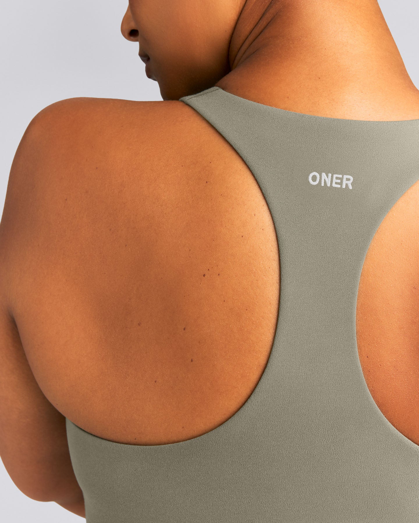 SoftMotion™ Racer Back Mid Tank Top with Built in Bra Shelf | Alpine Green