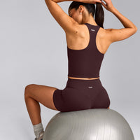 SoftMotion™ Racer Back Mid Vest with Built in Bra Shelf with Grey Logo | Plum Brown