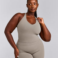 SoftMotion™ Racer Back Mid Vest with Built in Bra Shelf with White Logo | Warm Sand
