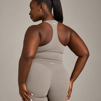 SoftMotion™ Racer Back Mid Vest with Built in Bra Shelf with White Logo | Warm Sand