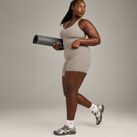 SoftMotion™ Racer Back Mid Vest with Built in Bra Shelf with White Logo | Warm Sand