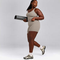 SoftMotion™ Racer Back Mid Vest with Built in Bra Shelf with White Logo | Warm Sand