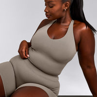 SoftMotion™ Racer Back Mid Vest with Built in Bra Shelf with White Logo | Warm Sand
