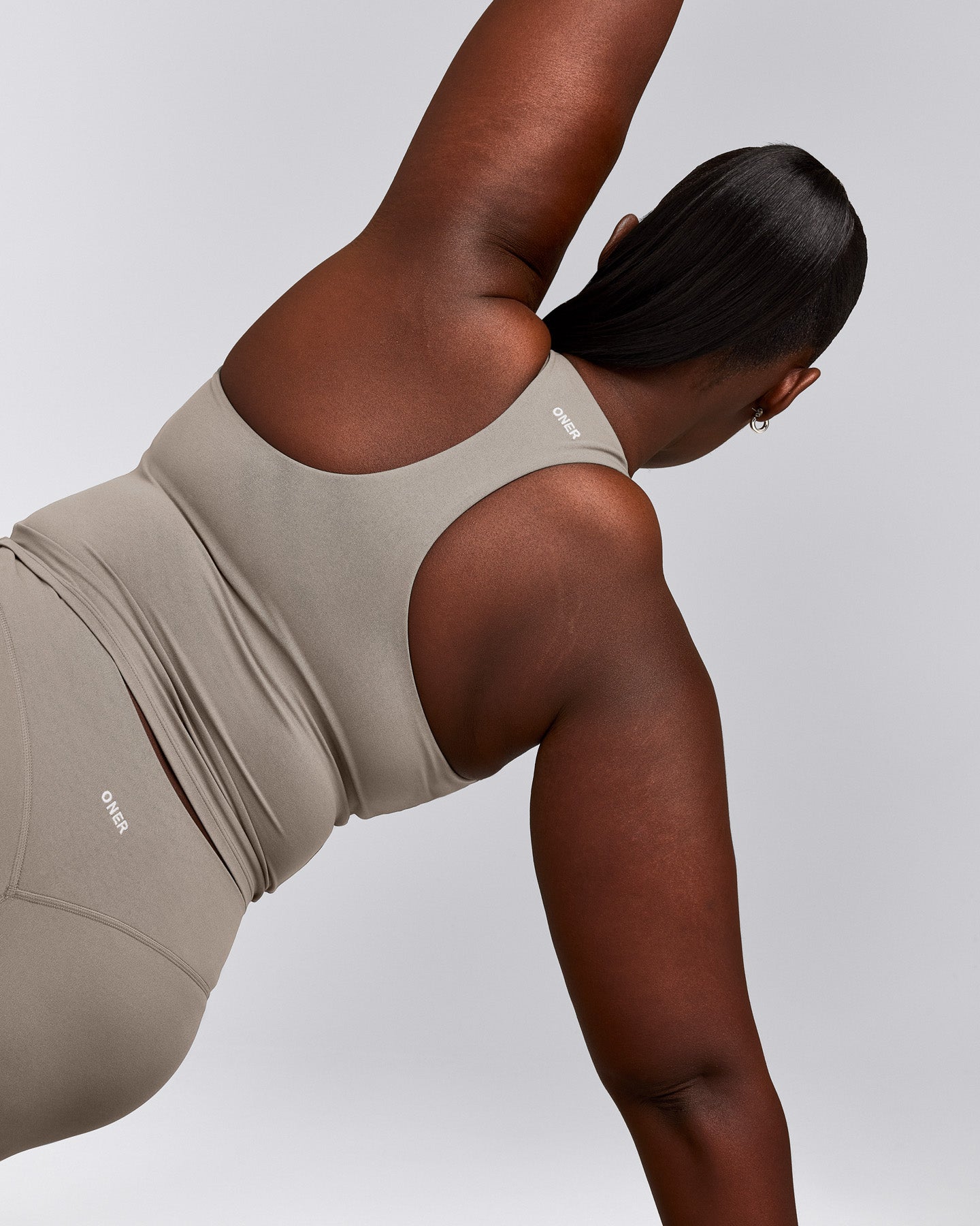 SoftMotion™ Racer Back Mid Vest with Built in Bra Shelf with White Logo | Warm Sand